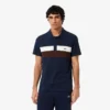 Herren-Poloshirt mit Regular Fit und Colorblock-Design aus Petit Piqué Herren-Poloshirt mit Regular Fit und Colorblock-Design aus Petit Piqué
