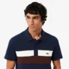 Herren-Poloshirt mit Regular Fit und Colorblock-Design aus Petit Piqué Herren-Poloshirt mit Regular Fit und Colorblock-Design aus Petit Piqué