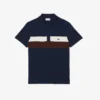 Herren-Poloshirt mit Regular Fit und Colorblock-Design aus Petit Piqué Herren-Poloshirt mit Regular Fit und Colorblock-Design aus Petit Piqué