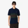 Herren-Poloshirt mit Streifen in klassischer Passform, hergestellt in Frankreich Herren-Poloshirt mit Streifen in klassischer Passform, hergestellt in Frankreich