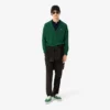 Herren-Poloshirt mit Streifen in klassischer Passform, hergestellt in Frankreich Herren-Poloshirt mit Streifen in klassischer Passform, hergestellt in Frankreich