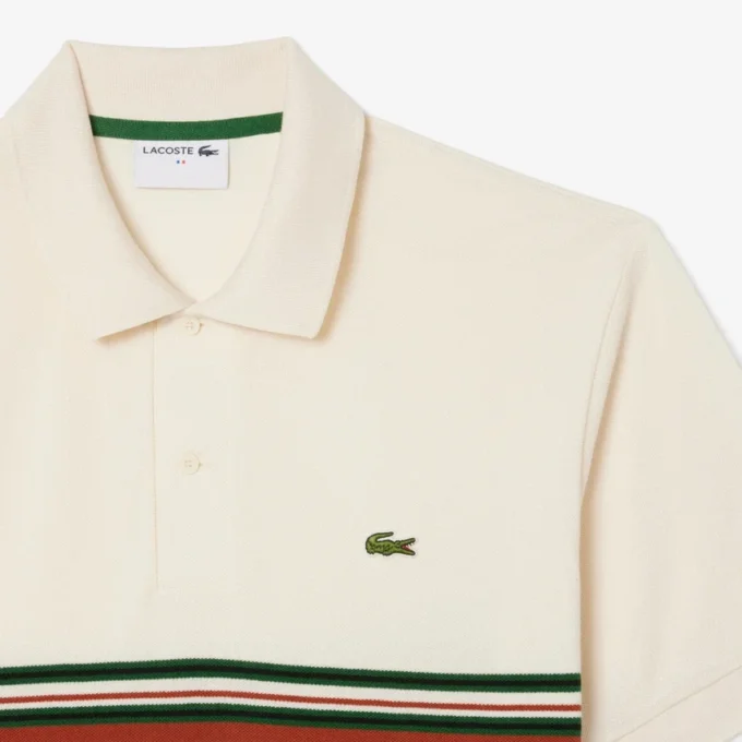 Herren-Poloshirt mit Streifen in klassischer Passform, hergestellt in Frankreich Herren-Poloshirt mit Streifen in klassischer Passform, hergestellt in Frankreich