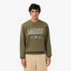 Herren-Sweatshirt aus Fleece mit gesticktem Motiv Herren-Sweatshirt aus Fleece mit gesticktem Motiv