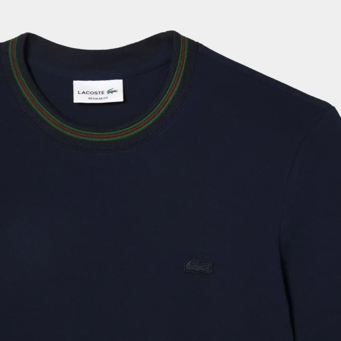 Herren-T-Shirt aus Stretch-Piqué mit gestreiftem Kragen Herren-T-Shirt aus Stretch-Piqué mit gestreiftem Kragen