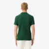 Herren-Tennis-Heritage-Poloshirt mit Ultra Dry-Emblem
