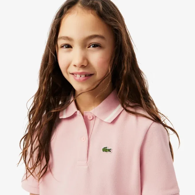 Kinder-Piqué-Poloshirt mit Falten am Rücken Kinder-Piqué-Poloshirt mit Falten am Rücken