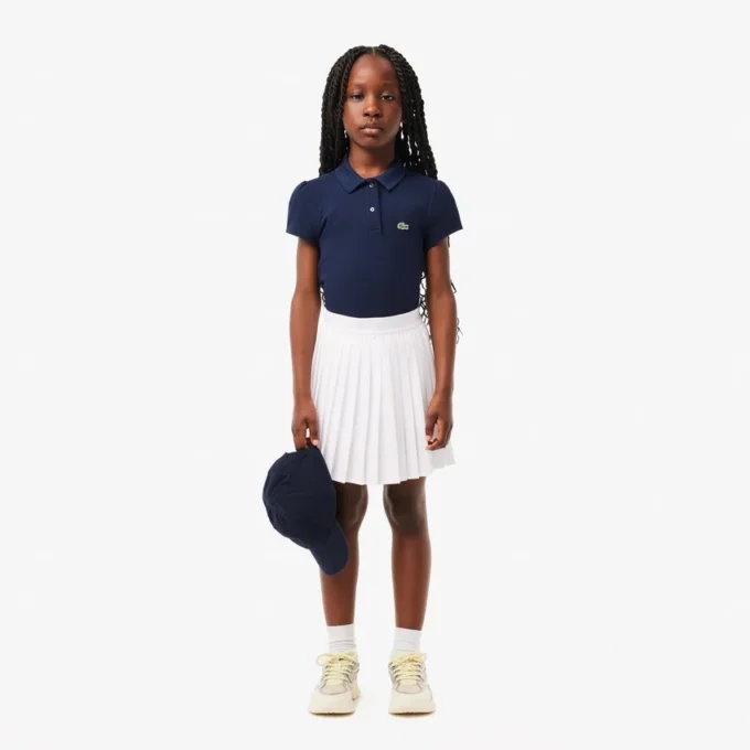 Kinder-Poloshirt mit gewelltem Kragen aus Mini-Piqué Kinder-Poloshirt mit gewelltem Kragen aus Mini-Piqué