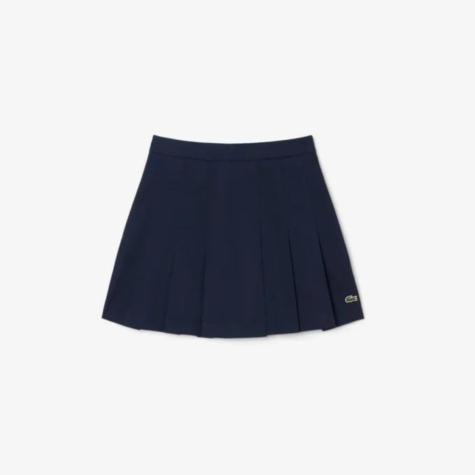 Kurzer Plisseerock aus Stretch-Baumwolle für Damen Kurzer Plisseerock aus Stretch-Baumwolle für Damen