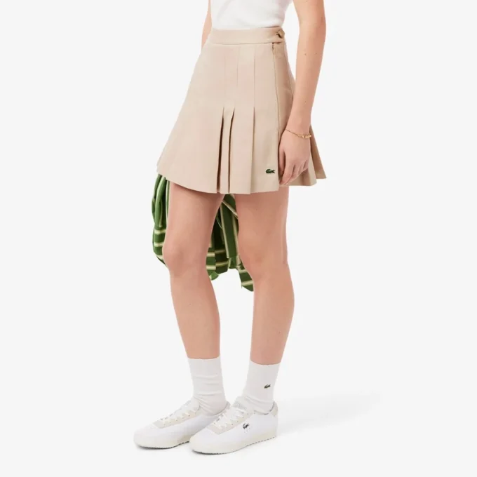 Kurzer Plisseerock aus Stretch-Baumwolle für Damen Kurzer Plisseerock aus Stretch-Baumwolle für Damen