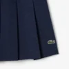 Kurzer Plisseerock aus Stretch-Baumwolle für Damen Kurzer Plisseerock aus Stretch-Baumwolle für Damen