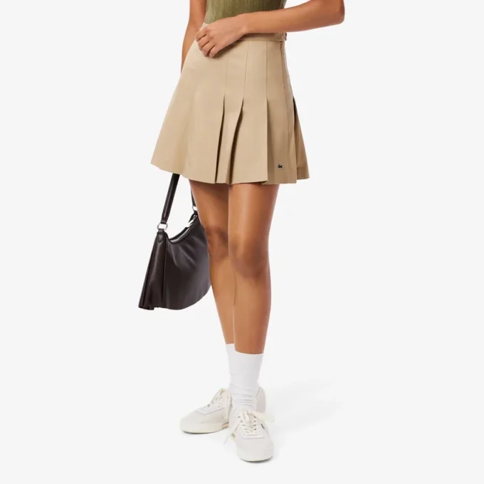 Kurzer Plisseerock aus Stretch-Baumwolle für Damen Kurzer Plisseerock aus Stretch-Baumwolle für Damen