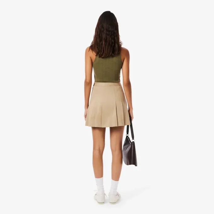 Kurzer Plisseerock aus Stretch-Baumwolle für Damen Kurzer Plisseerock aus Stretch-Baumwolle für Damen