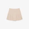 Kurzer Plisseerock aus Stretch-Baumwolle für Damen Kurzer Plisseerock aus Stretch-Baumwolle für Damen