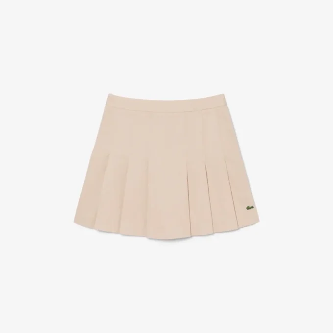 Kurzer Plisseerock aus Stretch-Baumwolle für Damen Kurzer Plisseerock aus Stretch-Baumwolle für Damen