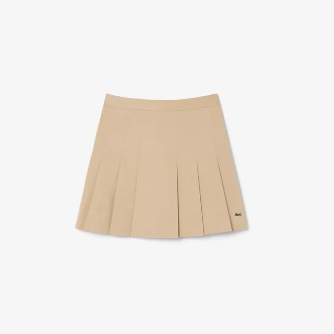 Kurzer Plisseerock aus Stretch-Baumwolle für Damen Kurzer Plisseerock aus Stretch-Baumwolle für Damen