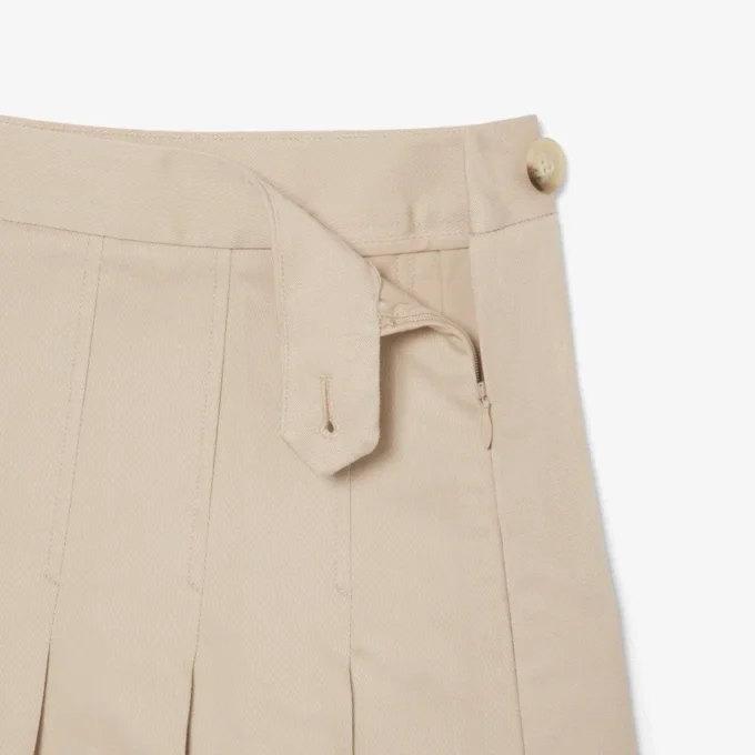 Kurzer Plisseerock aus Stretch-Baumwolle für Damen Kurzer Plisseerock aus Stretch-Baumwolle für Damen
