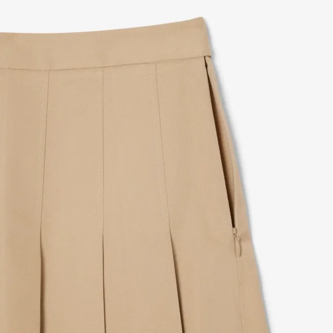 Kurzer Plisseerock aus Stretch-Baumwolle für Damen Kurzer Plisseerock aus Stretch-Baumwolle für Damen