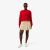 Kurzer Plisseerock aus Stretch-Baumwolle für Damen Kurzer Plisseerock aus Stretch-Baumwolle für Damen