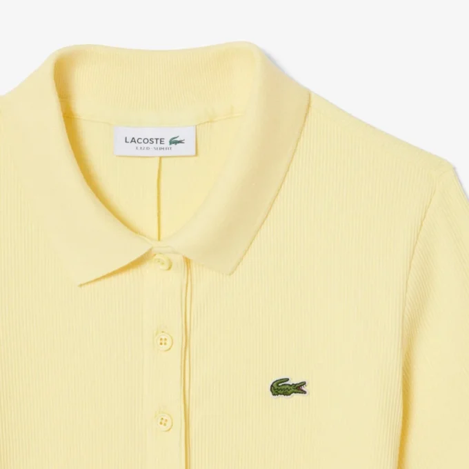 Langes Poloshirt aus gerippter Baumwolle für Damen Langes Poloshirt aus gerippter Baumwolle für Damen