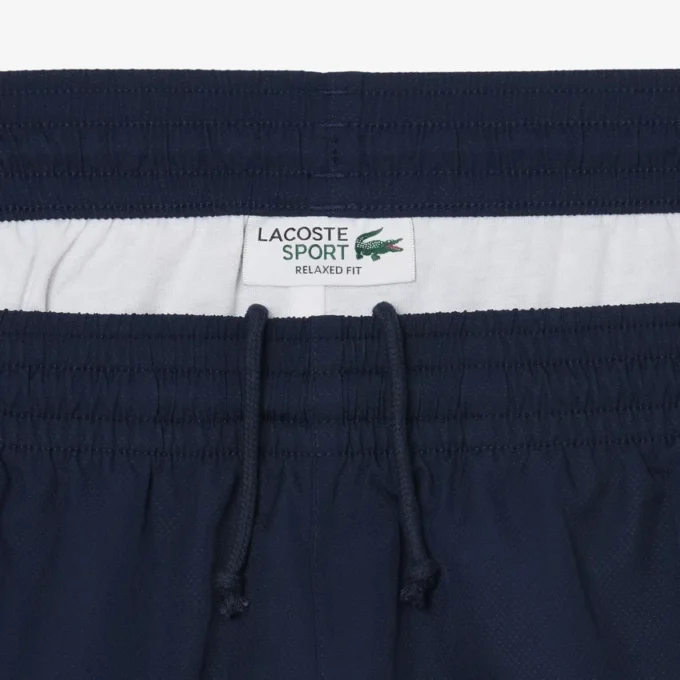 Leichte Tennis-Shorts für Herren mit Colorblock-Streifen Leichte Tennis-Shorts für Herren mit Colorblock-Streifen