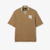 Oversized-Satin-Poloshirt mit Runway-Badge-Akzent