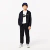 Oversized-Tennis-T-Shirt aus technischer Baumwolle für Kinder Oversized-Tennis-T-Shirt aus technischer Baumwolle für Kinder