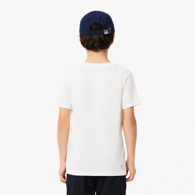 Oversized-Tennis-T-Shirt aus technischer Baumwolle für Kinder Oversized-Tennis-T-Shirt aus technischer Baumwolle für Kinder