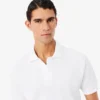 Petit-Piqué-Poloshirt mit Stickerei im klassischen Schnitt Petit-Piqué-Poloshirt mit Stickerei im klassischen Schnitt