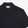 Petit-Piqué-Poloshirt mit Stickerei im klassischen Schnitt Petit-Piqué-Poloshirt mit Stickerei im klassischen Schnitt
