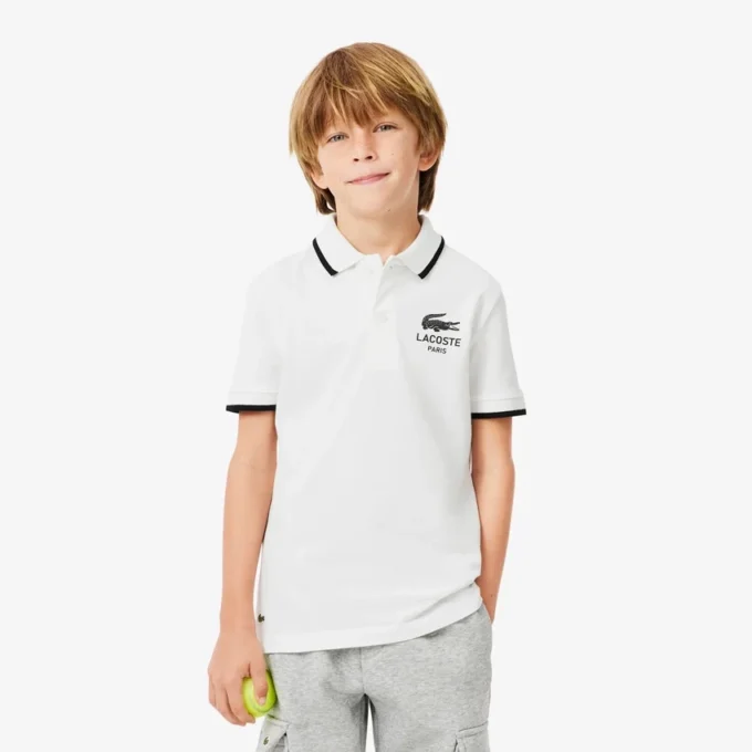 Petit Piqua Polo für Jungen mit gestreiftem Kragen Petit Piqua Polo für Jungen mit gestreiftem Kragen