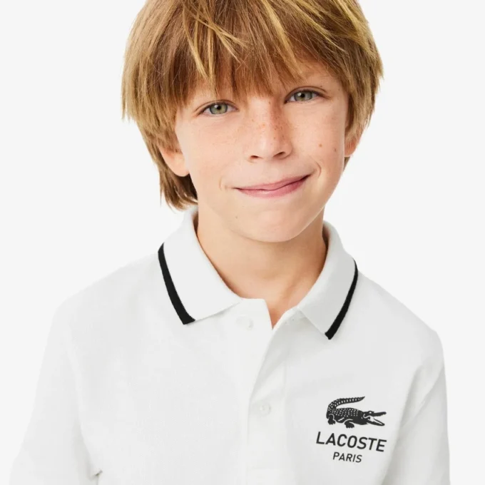 Petit Piqua Polo für Jungen mit gestreiftem Kragen Petit Piqua Polo für Jungen mit gestreiftem Kragen