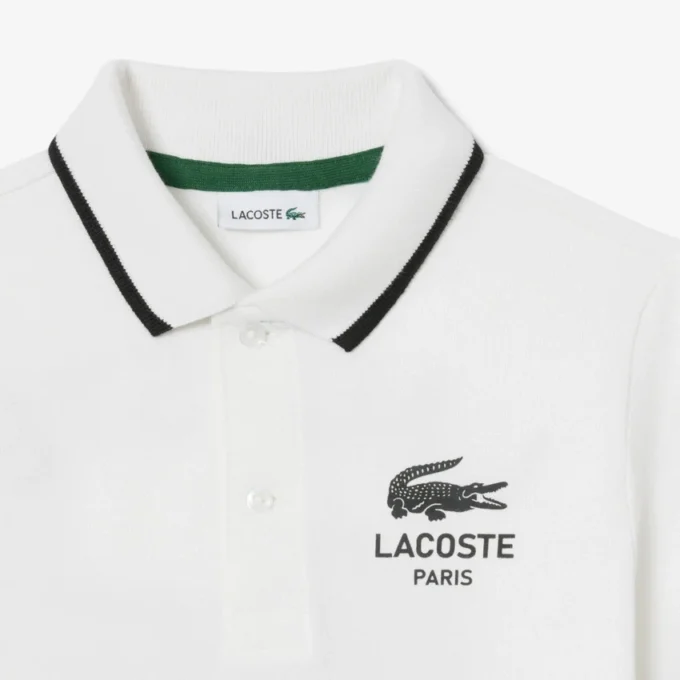 Petit Piqua Polo für Jungen mit gestreiftem Kragen Petit Piqua Polo für Jungen mit gestreiftem Kragen