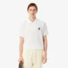 Polohemd mit klassischer Passform und Emblem-Akzent Polohemd mit klassischer Passform und Emblem-Akzent