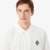 Polohemd mit klassischer Passform und Emblem-Akzent Polohemd mit klassischer Passform und Emblem-Akzent