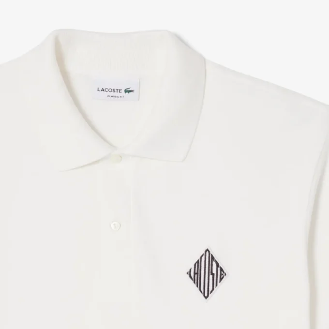 Polohemd mit klassischer Passform und Emblem-Akzent Polohemd mit klassischer Passform und Emblem-Akzent