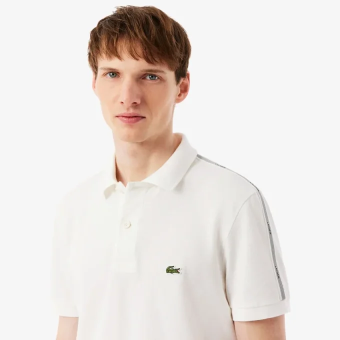 Polohemd mit Logo-Streifen in Regular Fit Polohemd mit Logo-Streifen in Regular Fit