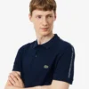 Polohemd mit Logo-Streifen in Regular Fit Polohemd mit Logo-Streifen in Regular Fit