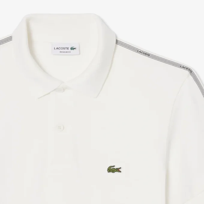 Polohemd mit Logo-Streifen in Regular Fit Polohemd mit Logo-Streifen in Regular Fit