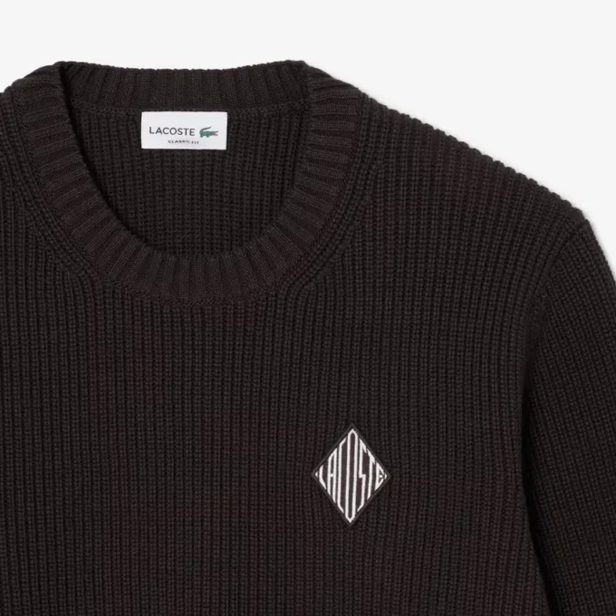 Pullover mit Perlen-Rippenstrick und Emblem Pullover mit Perlen-Rippenstrick und Emblem