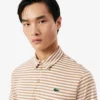 Regular Fit Ultra Dry gestreiftes Golf-Poloshirt Regular Fit Ultra Dry gestreiftes Golf-Poloshirt