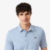 Regular Fit Ultra Dry gestreiftes Golf-Poloshirt Regular Fit Ultra Dry gestreiftes Golf-Poloshirt