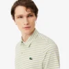 Regular Fit Ultra Dry gestreiftes Golf-Poloshirt Regular Fit Ultra Dry gestreiftes Golf-Poloshirt