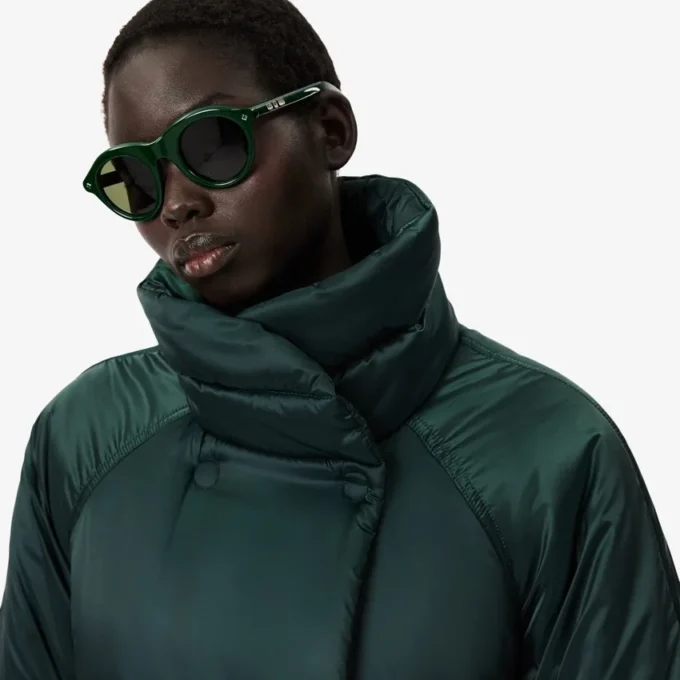 Runway Lange, schillernde Pufferjacke Runway Lange, schillernde Pufferjacke
