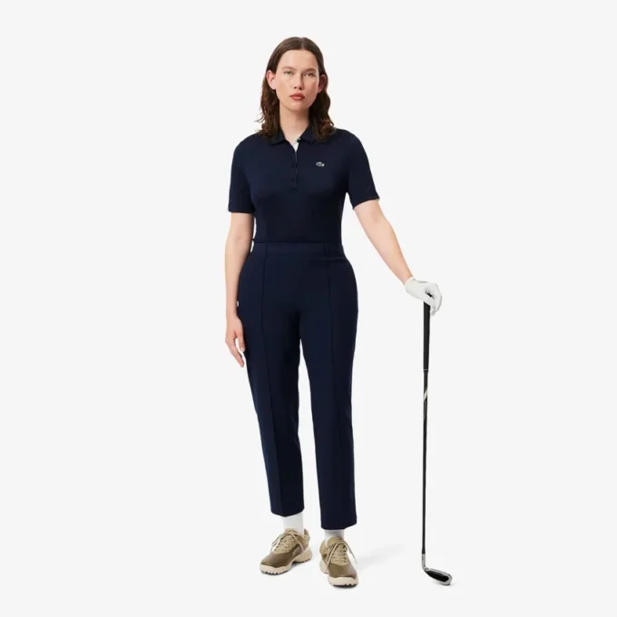 Slim-Fit-Golf-Poloshirt für Damen mit UV-Schutz und Stretch Slim-Fit-Golf-Poloshirt für Damen mit UV-Schutz und Stretch