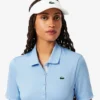 Slim-Fit-Golf-Poloshirt für Damen mit UV-Schutz und Stretch Slim-Fit-Golf-Poloshirt für Damen mit UV-Schutz und Stretch