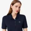 Slim-Fit-Golf-Poloshirt für Damen mit UV-Schutz und Stretch Slim-Fit-Golf-Poloshirt für Damen mit UV-Schutz und Stretch