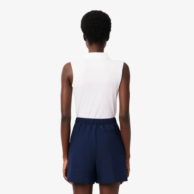 Slim-Fit-Golf-Poloshirt für Damen mit UV-Schutz und Stretch Slim-Fit-Golf-Poloshirt für Damen mit UV-Schutz und Stretch