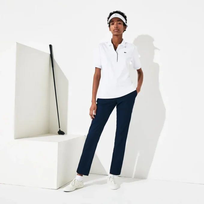 Slim-Fit-Golf-Poloshirt für Damen mit UV-Schutz und Stretch Slim-Fit-Golf-Poloshirt für Damen mit UV-Schutz und Stretch