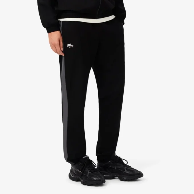 Sportlicher Herren-Trainingsanzug mit Krokodil-Print Sportlicher Herren-Trainingsanzug mit Krokodil-Print
