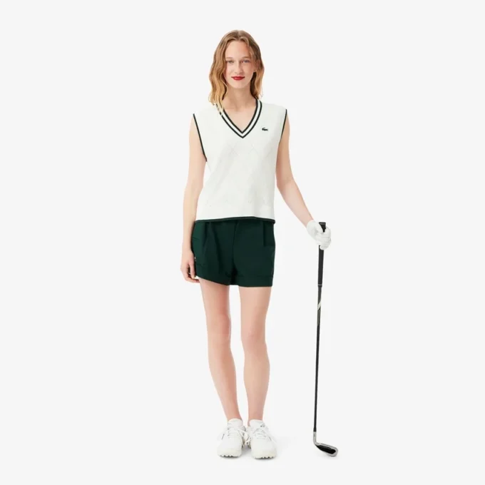 Stretch-Strickweste für Damen beim Golf Stretch-Strickweste für Damen beim Golf